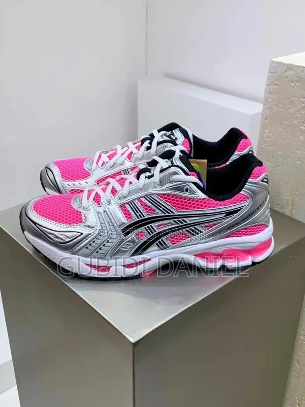 ASICS GEL-Kayano 14 in the 'Pink / Silver · Photo 1