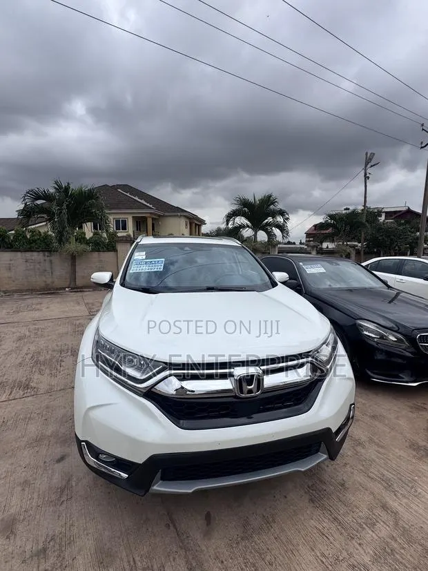 Honda CR-V Touring 4dr SUV AWD (1.5L 4cyl CVT) 2017 Off white · Photo 1