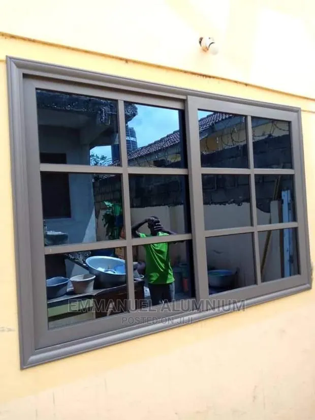 Gray Division With Blue Reflective Glass · Photo 1