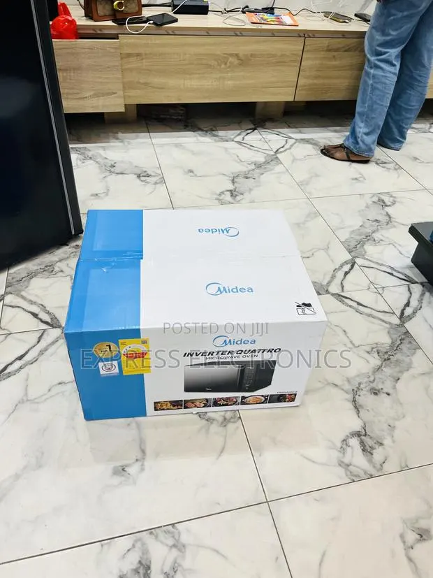 Limited Stock Midea 30L Solo Microwave (EM9P032MO-B)900W Countertop · Photo 1