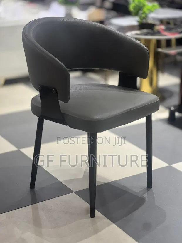 Modern Curved Dining Chair · Photo 1