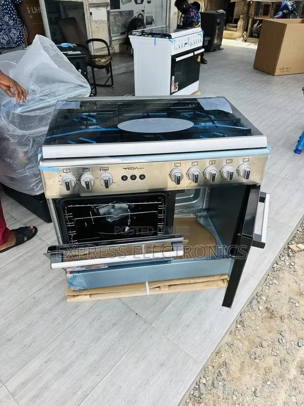 Hot Deal on Midea Tech Gas Cooker Oven 5burner 60/90 Silver · Photo 1