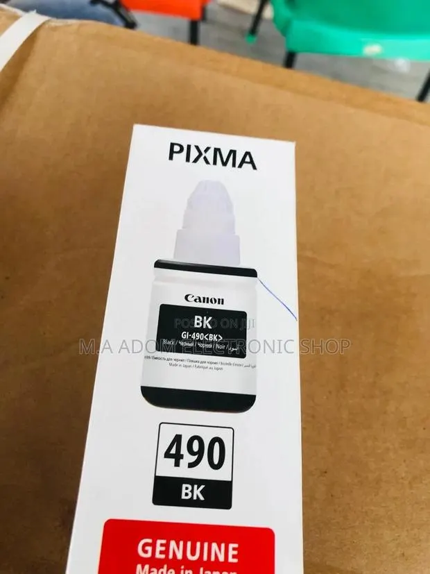 Canon GI-590 Ink Bottles: Print More, Pay Less · Photo 1
