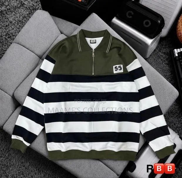 Men's Casual Striped Polo Shirt With Loose Fit and Stand-Up Collar. · Photo 1