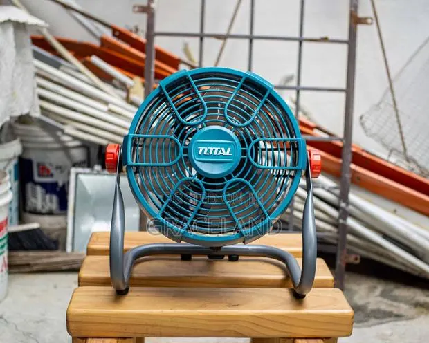 This Is Original Industrial Floor and Desktop Fan Cordless 12 Inches. · Photo 1