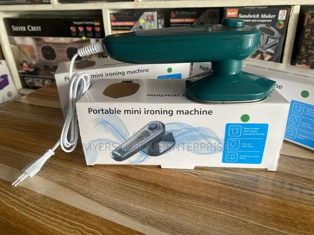 Mini Steam Iron(Quick Fix for Creased Clothes) · Photo 1