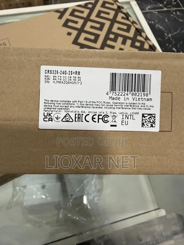 MikroTik CRS326-24G-2S+RM 24-Port Gigabit Managed Network Switch · Photo 1