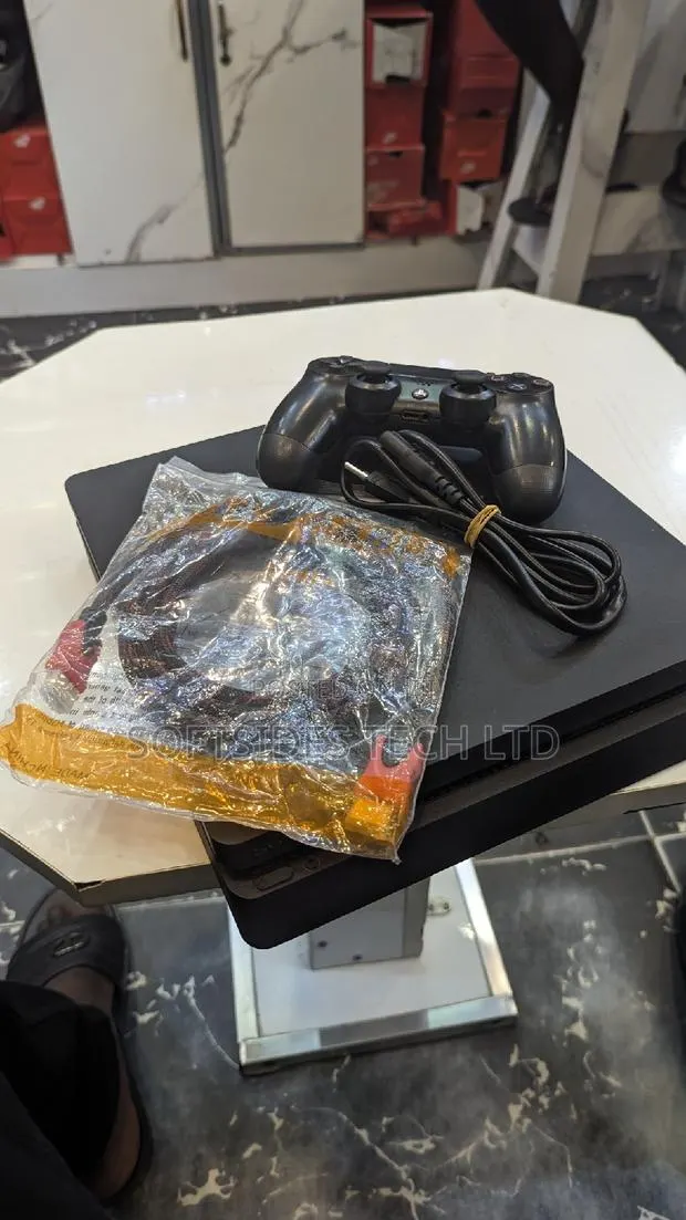 Ps4 Set With Controller, Hdmi, Charger and 500gb Storage. · Photo 1