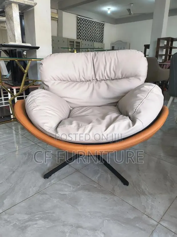 Two Tone Swivel Lounge Chair · Photo 1