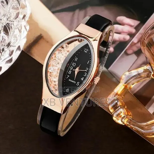 Women's Black Oval Analog Watch · Photo 1