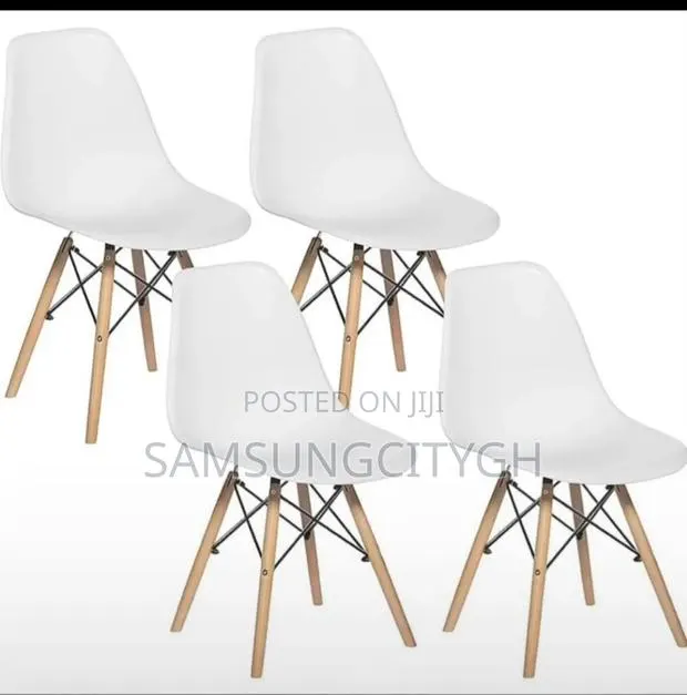 Modern White Eames Dinning Chairs · Photo 1