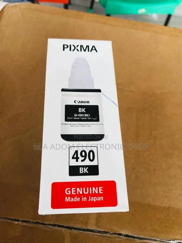 Canon GI-590 Ink Bottles: High-Yield, Low-Cost Printing · Photo 1