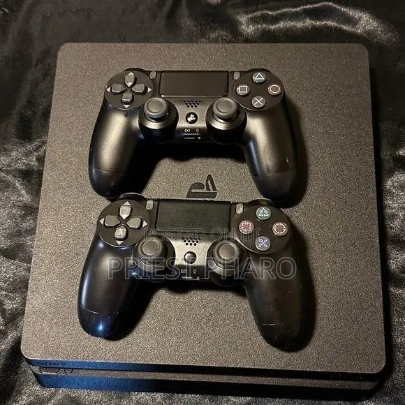 PS4 Slim With 2 Controllers, · Photo 1