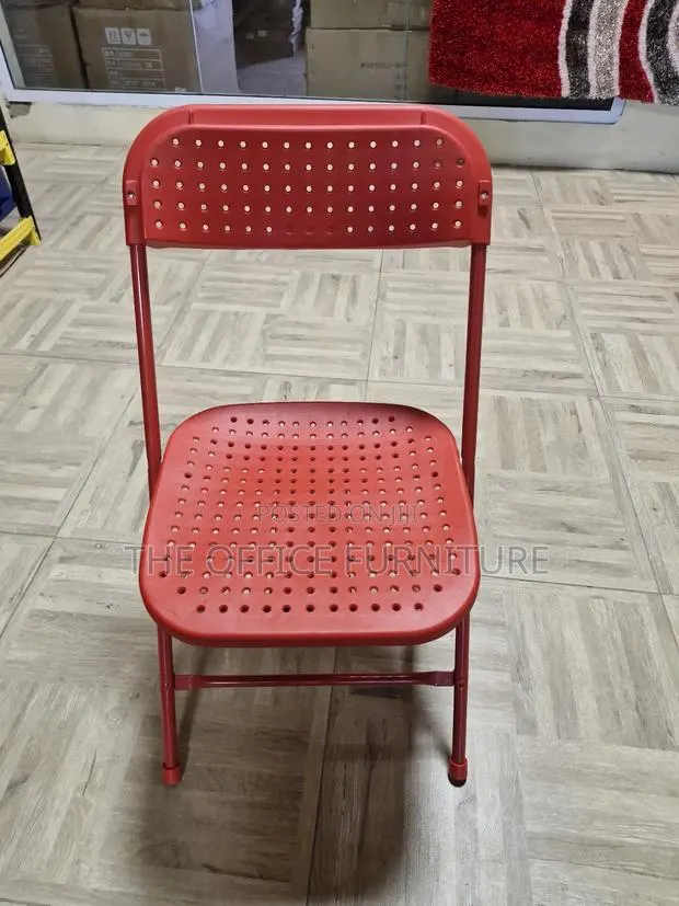 Red Plastic Folding Chair · Photo 1