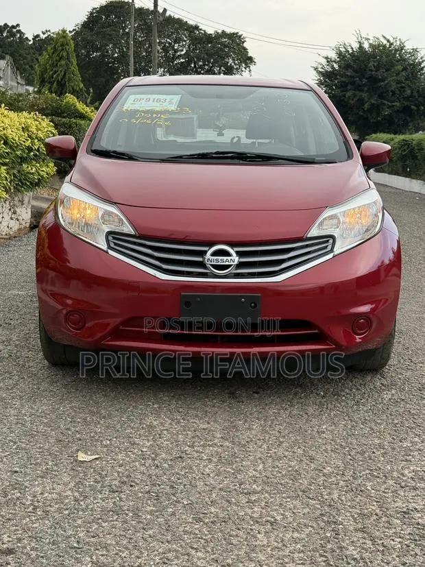 Nissan Versa 1.6 S 4dr Sedan (1.6L 4cyl 4A) 2015 Red · Photo 1