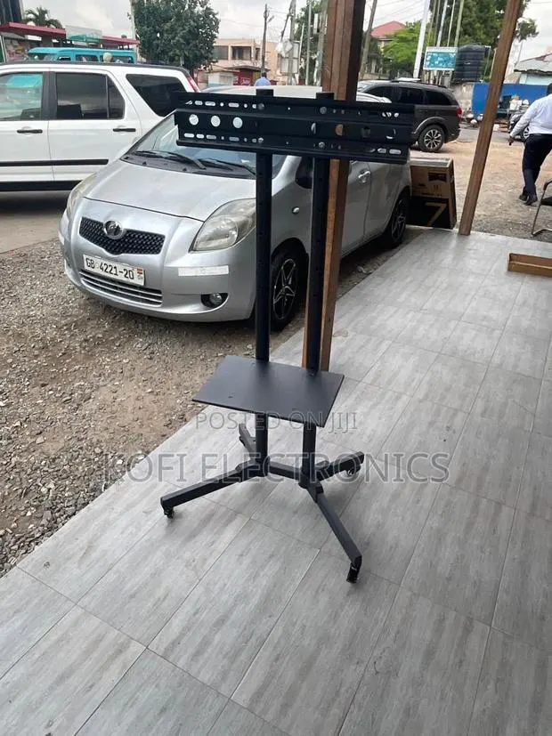 Adjustable Tv Stand Cabinet for 32–65” Screens · Photo 1