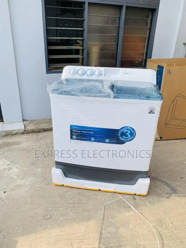 Ultra Modern Sleek WM Topload Twintub 18Kg Midea Semi Automatic · Photo 1