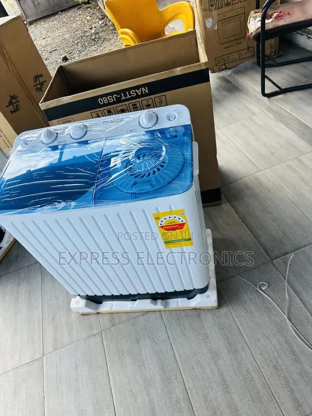 Quick Wash and Spin 7kg Topload Twintub Nasco · Photo 1