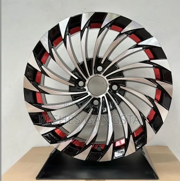 Clean Set of Size 15 Alloy Rims 4 Holes- Suitable for Vitz, Yaris, Etc · Photo 1
