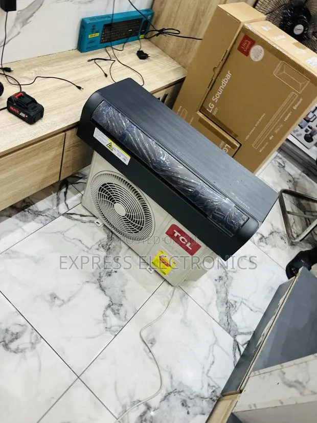Call and Order for the New TCL Dark Grey 1.5hp Inverter · Photo 1
