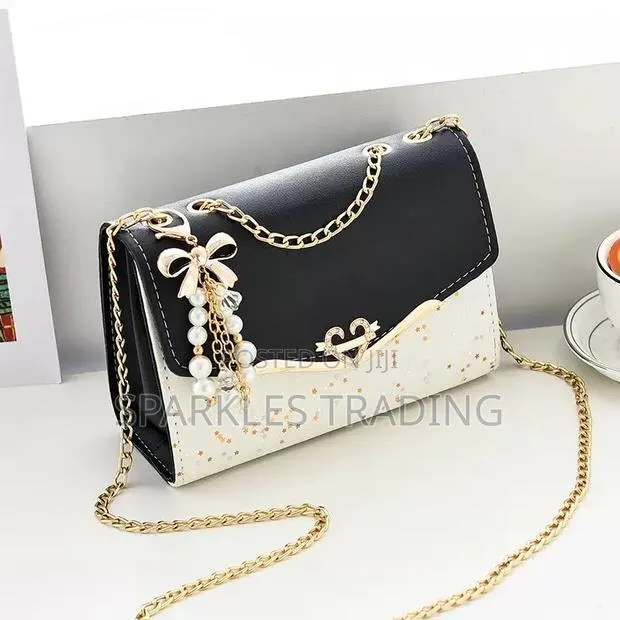 Shoulder Bag · Photo 1