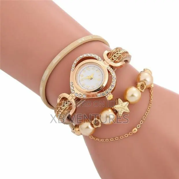 Women Quartz Bracelet Watch Fashion Wrist Watches - Gold · Photo 1