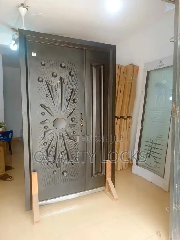 Standard and Affordable Black Metal Door · Photo 1