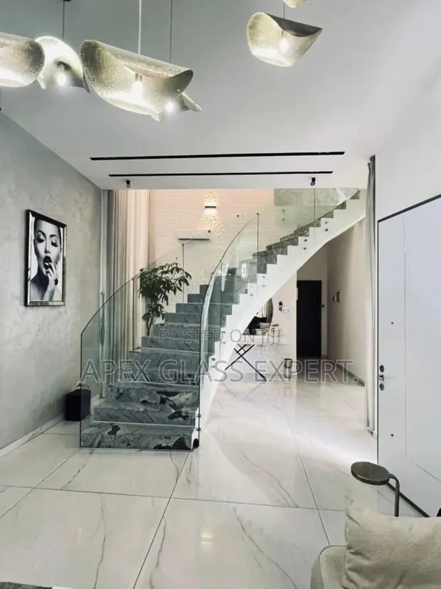 Curved Glass Staircase Call Us Now · Photo 1