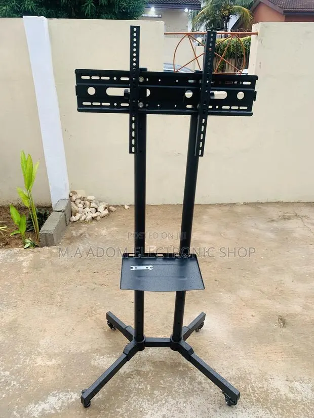 Mobile Tv Stand With Wheels Suitable for Tv Between 32”-70” · Photo 1