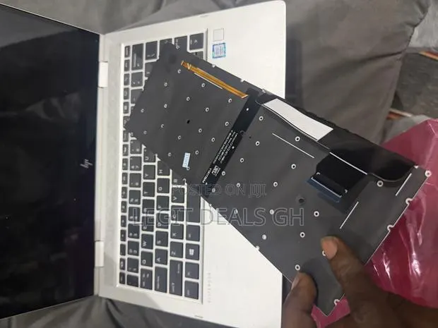 Laptop Keyboard and Battery Replacement · Photo 1