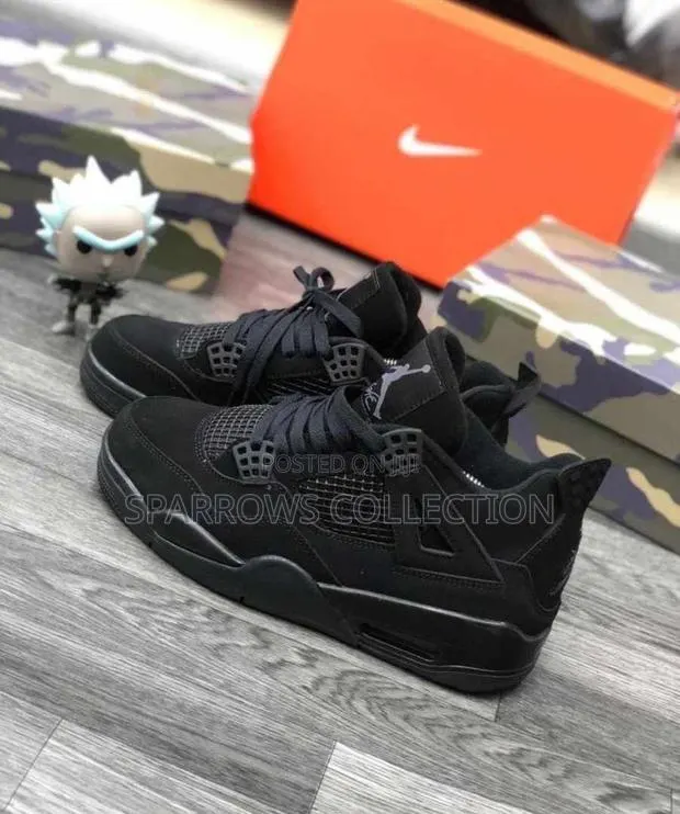 Air Jordan 4 Black Cat · Photo 1