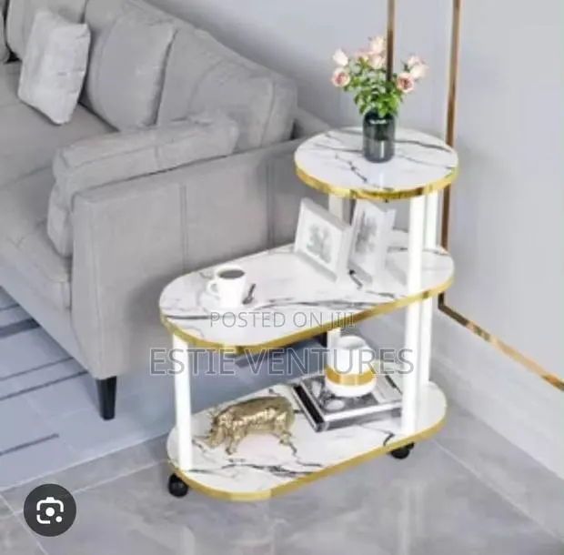 Marble Side Table Features a Three-Tier · Photo 1