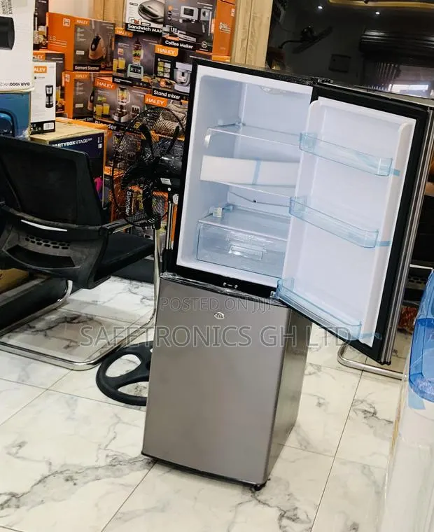 Elegant Grey Nasco Nasd2-20fl Is a 158-Litre Double-Door Refrigerator · Photo 1