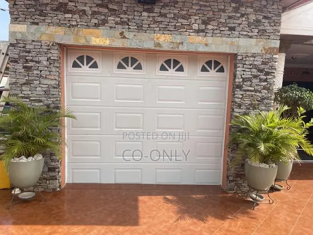 Automated Garage Door · Photo 1