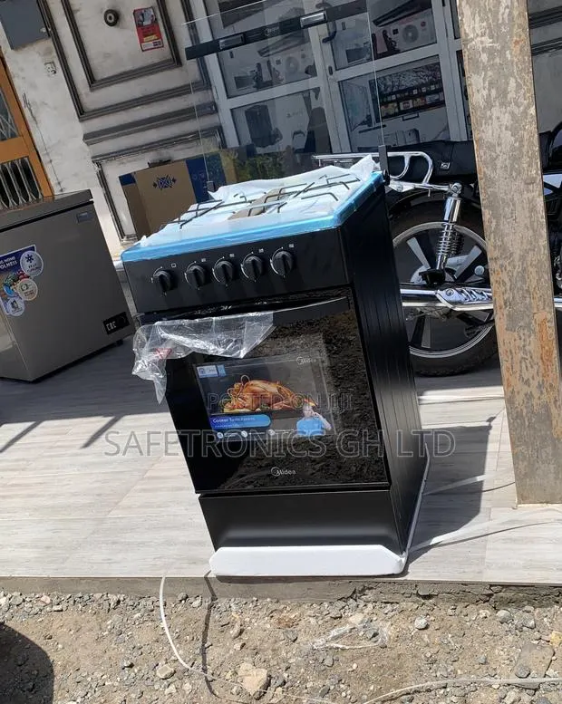 Check Out Midea 4 Burner Gas Cooker Lack Mirror · Photo 1