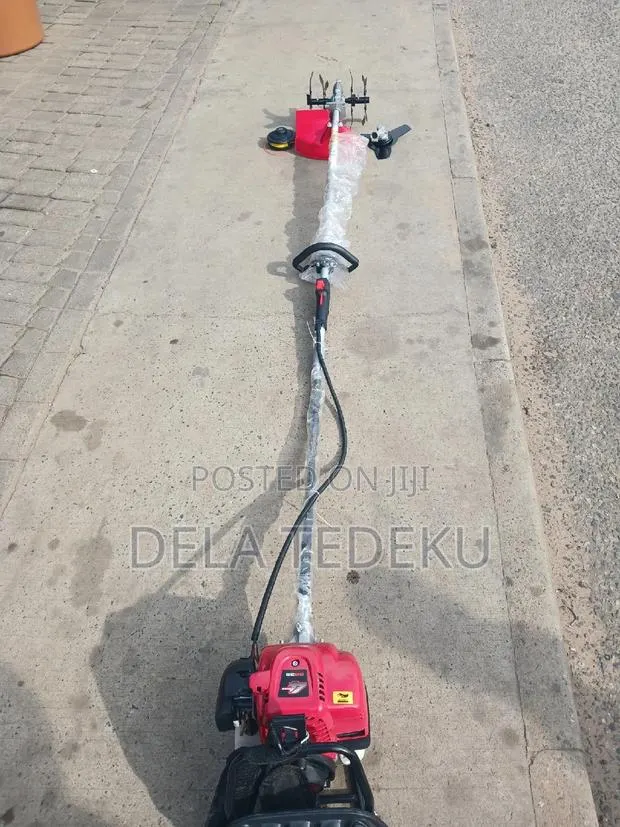 4-Stroke Back Pack Bush Cutter + Tiller, Blade,And Trimmer · Photo 1