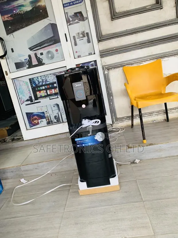 Just Purchase Midea Top Loading Water Dispenser - Black · Photo 1