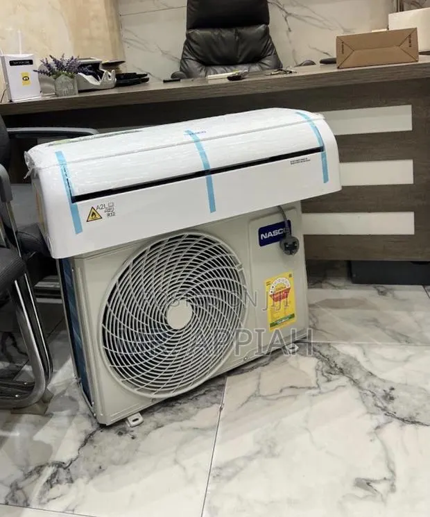 Lovely Design Nasco 1.5hp Dual Inverter Air Conditioner + Remote. · Photo 1