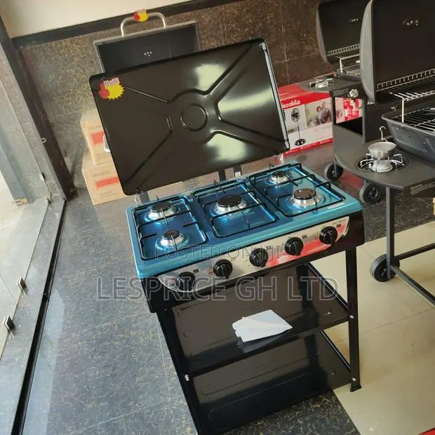 Price Slash on Our Ultra Modern 5 Burner Gas Stove With Shelf · Photo 1