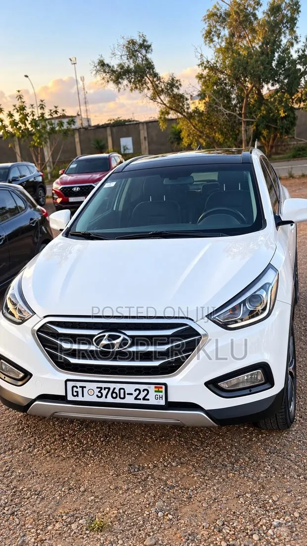 Hyundai Tucson 2014 White · Photo 1