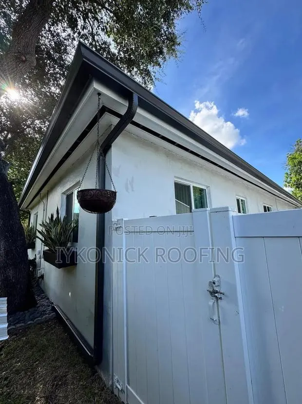 PVC Rain Gutters System Installation · Photo 1
