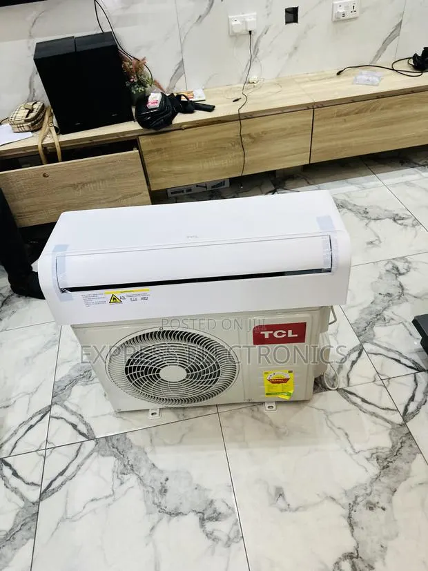 Text Us for Your New Split R410 Gas 1.5hp TCL White Air Conditioner · Photo 1