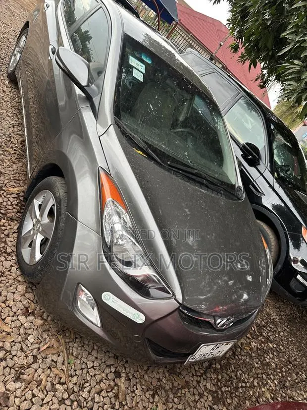 Hyundai Elantra GLS Sedan FWD (1.8L 4cyl 6M) 2013 Gray · Photo 1