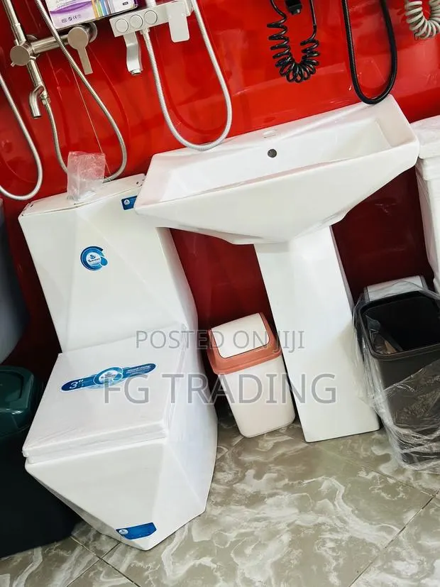 Water Closet - Diamond Toilet Seat With Pedestal Basin · Photo 1