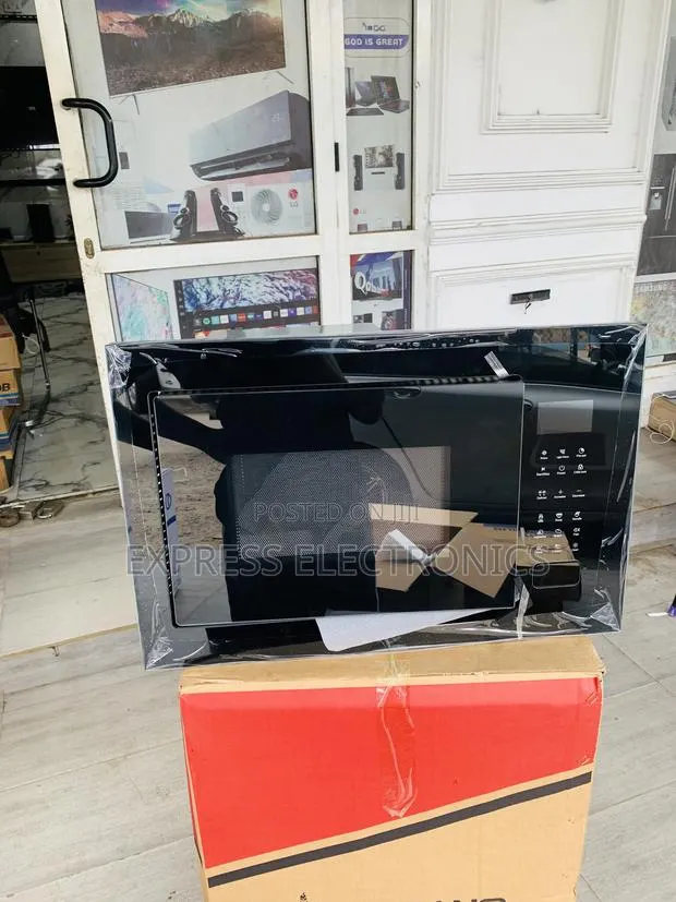 Hot Deals on Kenwood Microwave Built in Sliver · Photo 1