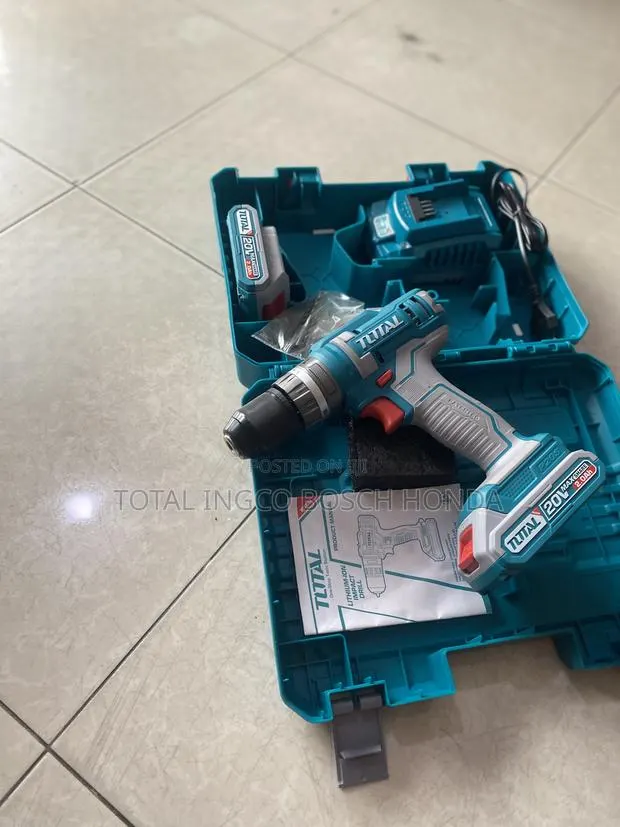 Drilling Machine, Battery With Charger · Photo 1