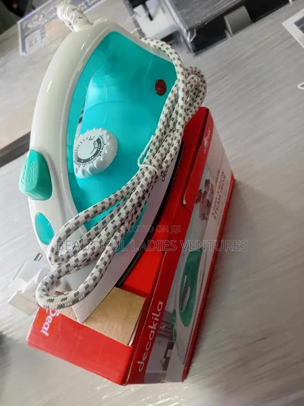 Premium Steam Iron With Non-Stick Soleplate · Photo 1