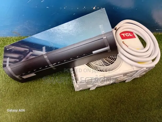 TCL Mirror Panel 1.5hp Inverter Air Conditioner · Photo 1