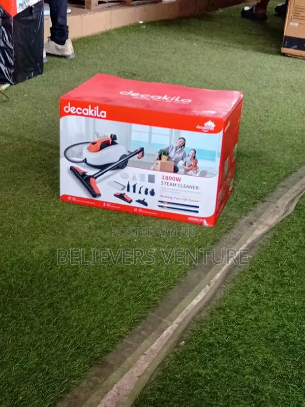 Portable Steam Cleaner for Upholstery and Carpets · Photo 1