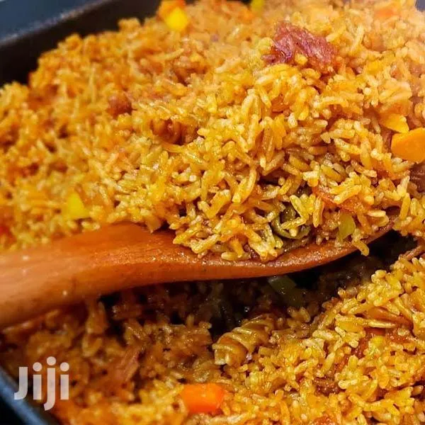 Rice and Chicken,Fish,Pork,Beefand Goat With Yam,Banku,More · Photo 1